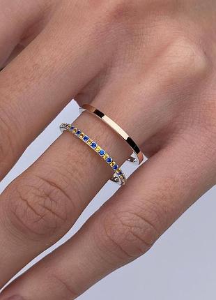 Серебряное кольцо с золотом и фианитами