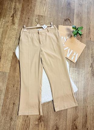 Класичні бежеві брюки