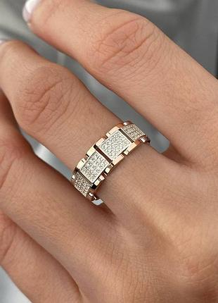 Серебряное кольцо с золотом и фианитами