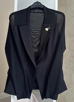 Елегантний жіночий піджак