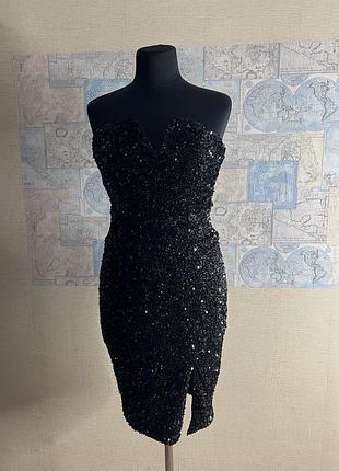 Жіноча елегантна сукня по фігурі в паєтках