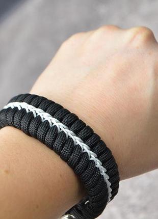 Браслет с застежкой волк из мельхиора и оплеткой декоративной нитью