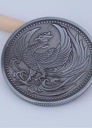 Монета сувенирная "птица феникс" (цвет - серебро).