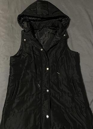 Жіноча жилетка подовженна