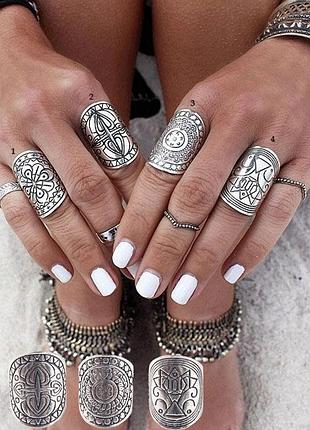 Комплект з 4 сріблястих каблучок розмір 16