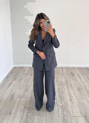 Класичний жіночий костюм (піджак на підкладці з лечиками, брюки палаццо на потайній блискавці)