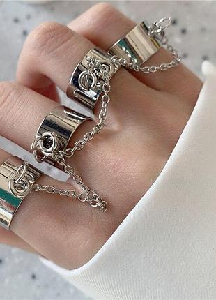 Комплект сріблястих каблучок з ланцюжками, зміна розміру