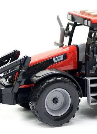 Детская игрушка трактор