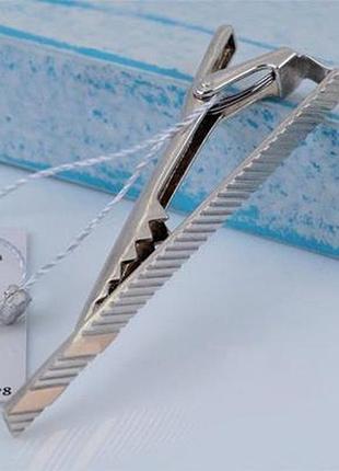 Серебряный зажим для галстука с золотыми напайками 875/375 пробы.