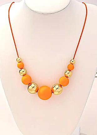 Стильне яскраве кольє помаранчеве