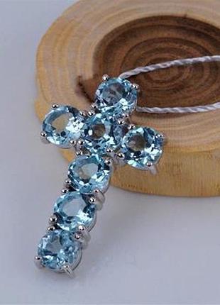 Кулон-крест серебряный с голубыми топазами 925 пробы.