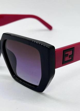 Окуляри сонцезахисні поляризаційні жіночі в масивній пластиковій оправі з широкими червоними дужками