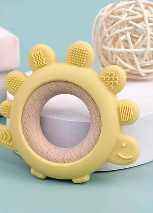 Дитячий прорізувач для зубів dino круглий силіконовий гризунок - іграшка на руку, жовтий