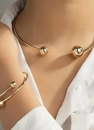 Комплект кольє та браслет на верх руки