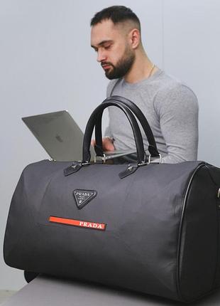 Дорожная сумка кожаная мужская prada, черная для путешествий прада