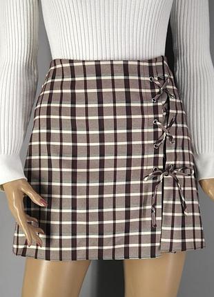Новая брендовая юбка мини со шнуровкой "primark" в клеточку. размер uk10/eur38.