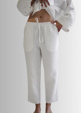 Штани білі з льону жіночі