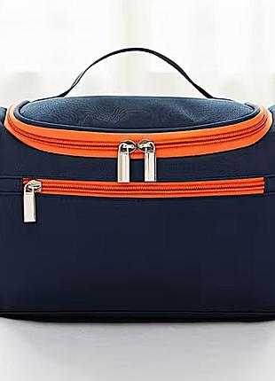 Компактна косметичка-органайзер з безліччю відділень і кишень. синій оранж