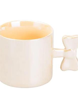 Чашка з ручкою у вигляді бантика порцелянова 350 мл жовта hp7185y