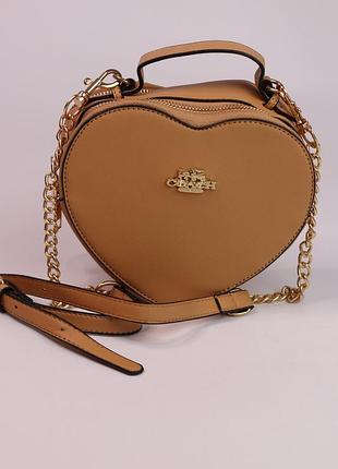Coach heart light brown