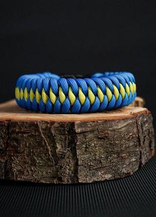 Браслет из паракорда в плетении dragon teeth на пластиковой застежке, цвет изделия под заказ желтый с голубым