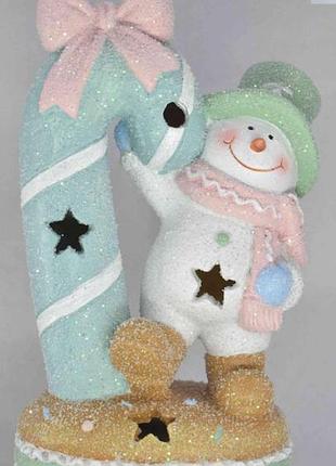 Новорічна фігурка з підсвіткою сніговик з льодяником 21 см — порцеляновий декор з led підсвіткою для дому