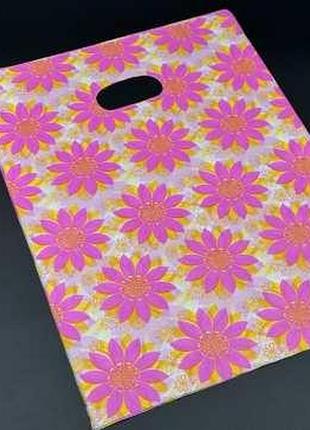 Подарункові поліетиленові пакети 25х35см ромашки. колір розовий. / подарункові поліетиленові пакети 25х35см ромашки. колір