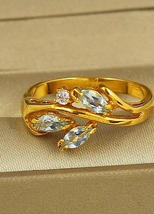 Кільце no name три риса блакитний топаз 19 р золотисте