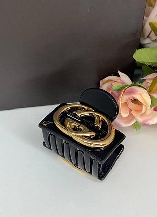 Гуччи краб для волос черный с логотипом золотого цвета