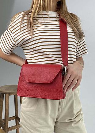 Цікава кругла жіноча сумочка невеликого розміру на довгому ремішку червоний