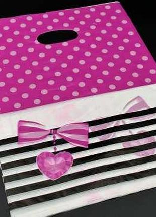 Подарункові поліетиленові пакети 25х35см бантик. колір розовий. / подарункові поліетиленові пакети 25х35см бантик. колір розовий.