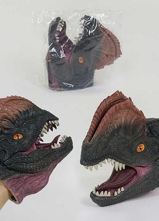 Резиновая голова динозавра надевается на руку