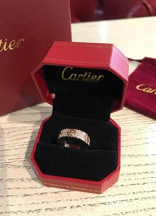 Cartier кільце в рожевому золоті з камінням / cartier кільце love з дрібним цирконієм