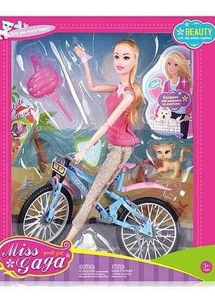 Кукла барби на велосипеде с кошечкой