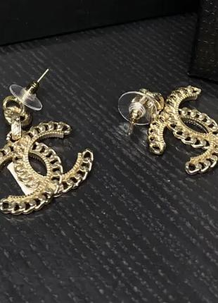 Сережки позолоченны с лого