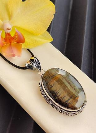 Підвісок соколине око. підвіс соколине око. кулон з соколиного ока. індія.