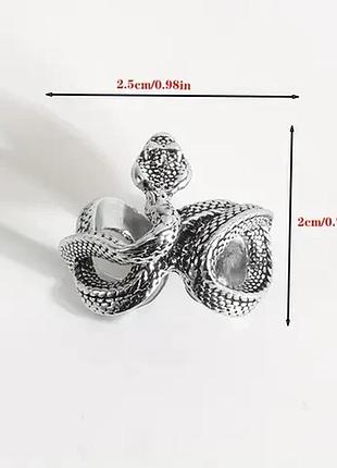 Срібляста каблучка змія, зміна розміру