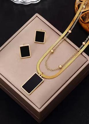 Оригінальний комлект біжутерії золотистиго кольору
