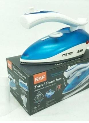 Дорожня парова праска для одягу