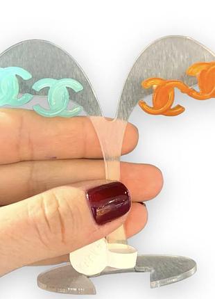 Сережки з логотипом у блакитному кольорі / емаль