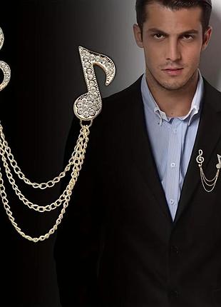 Подвійна брошка з ноткою