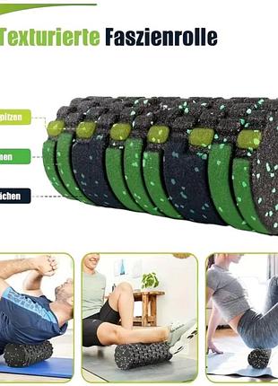 Массажный ролик для йоги и фитнеса 33*14 см черно-зеленый