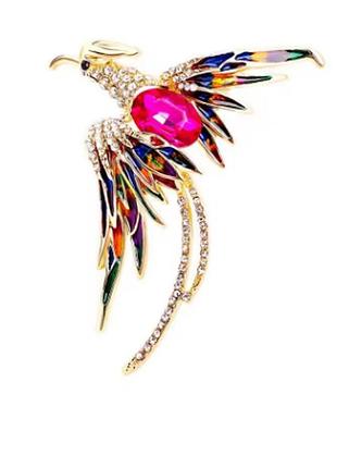 Золотистая брошь с горным хрусталем в виде птички