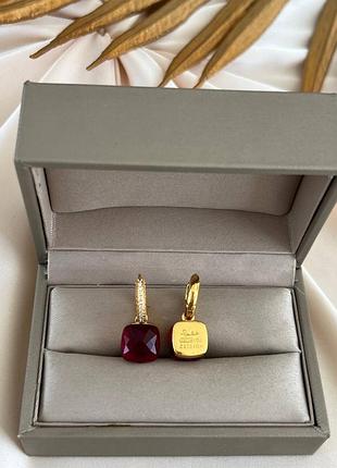 Сережки помелато циркони позолота 18 к/срібниці з бордовим кристалом
