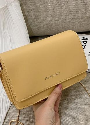 Жіноча мінісумка клатч на плече жовтий