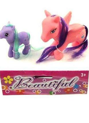 Уценка. пони резиновый, 2 штуки - грязная упаковка