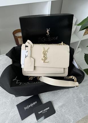 Жіноча сумочка клатч yves saint-laurent lux молочний є