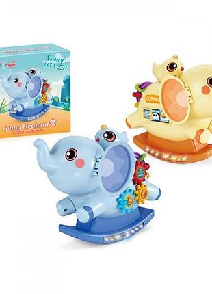 Іграшка музична "слон-гойдалка" 18см, hd9329