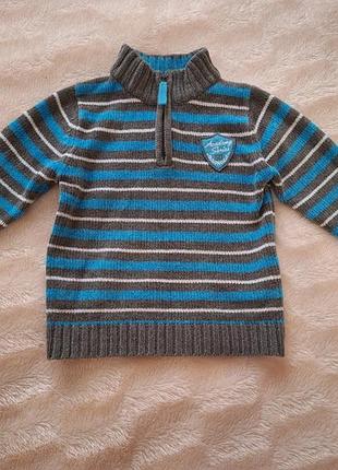 Теплий светр у смужку