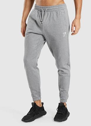 Gymshark штани essential joggers 
регулярный крой